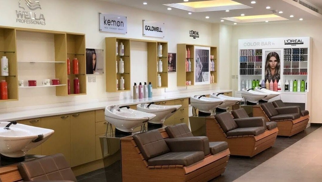 Modern salon chairs and product display at Primadonna Center, الظهران, المنطقة الشرقية, SA.