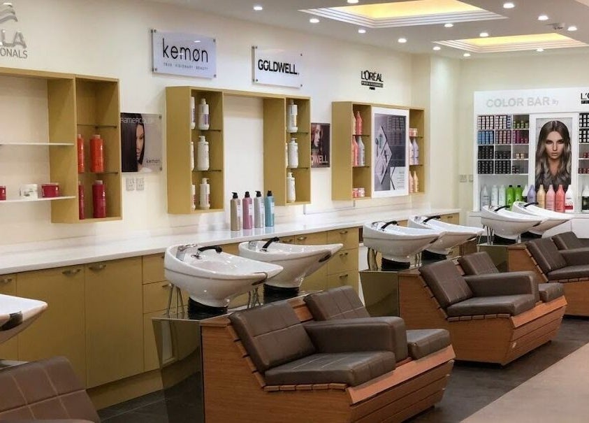Modern salon chairs and product display at Primadonna Center, الظهران, المنطقة الشرقية, SA.