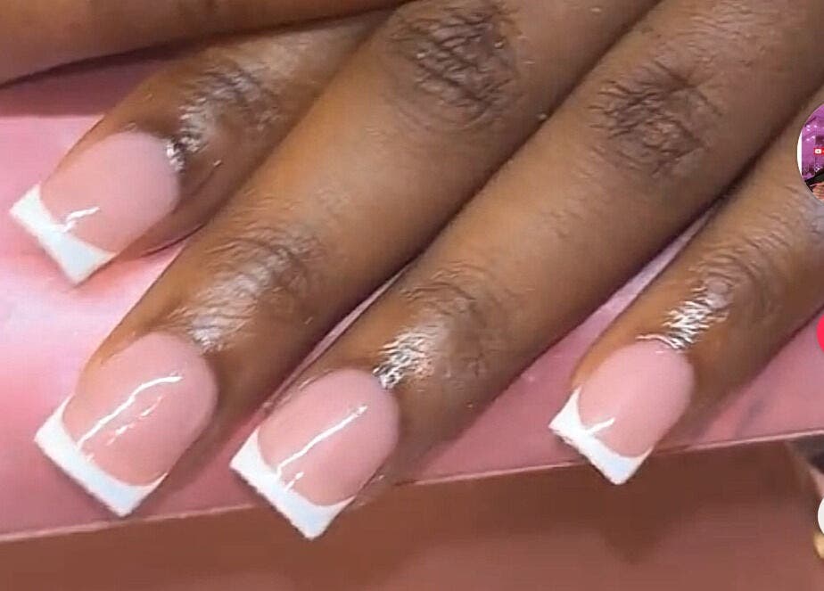 French manicure with glossy finish at Nailzbyari, Columbus, Ohio, US.