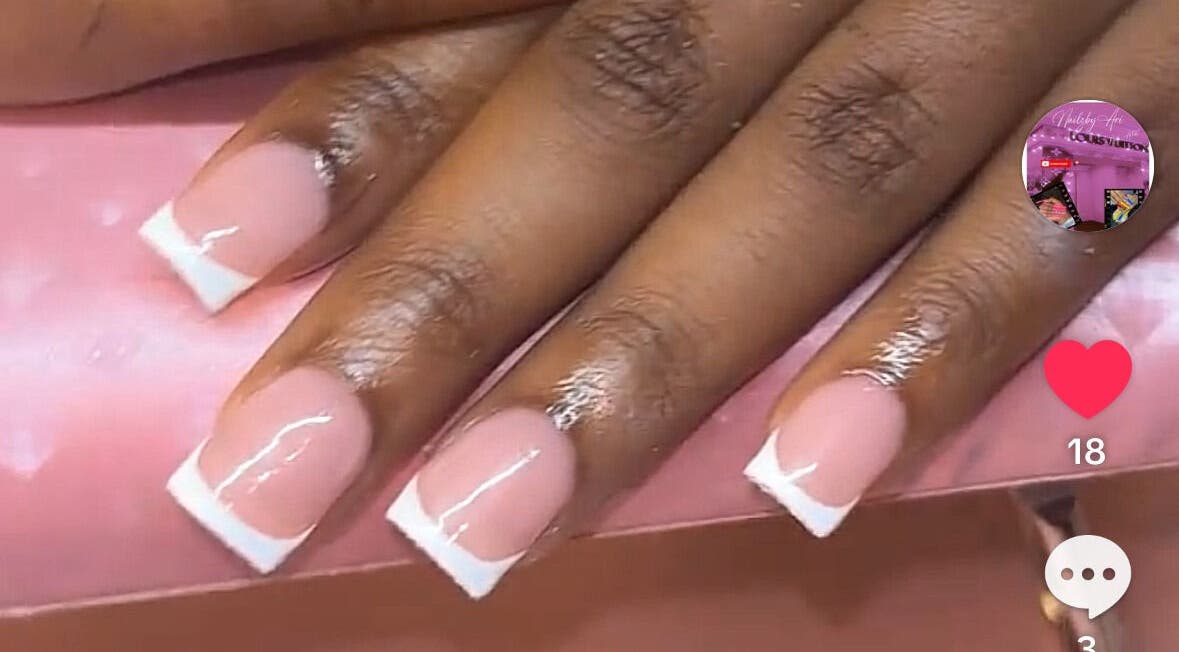 French manicure with glossy finish at Nailzbyari, Columbus, Ohio, US.