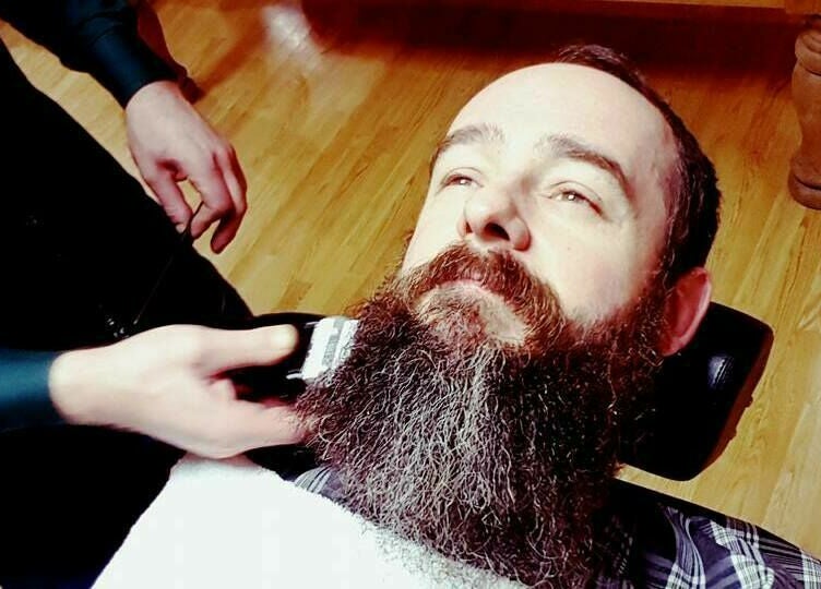 Beard grooming at Basement 68 Barbers in Leeds, England, GB, showcasing expert styling and detailing.