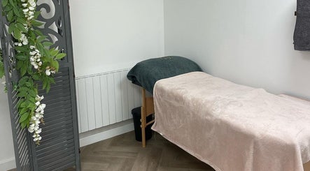 Relaxing massage table at The Beauty Hut Pontyclun, Pontyclun, Wales, GB, ready for a soothing wellness session.