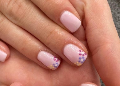 Elegant floral nail art at The Beauty Hut Pontyclun, Pontyclun, Wales, GB.