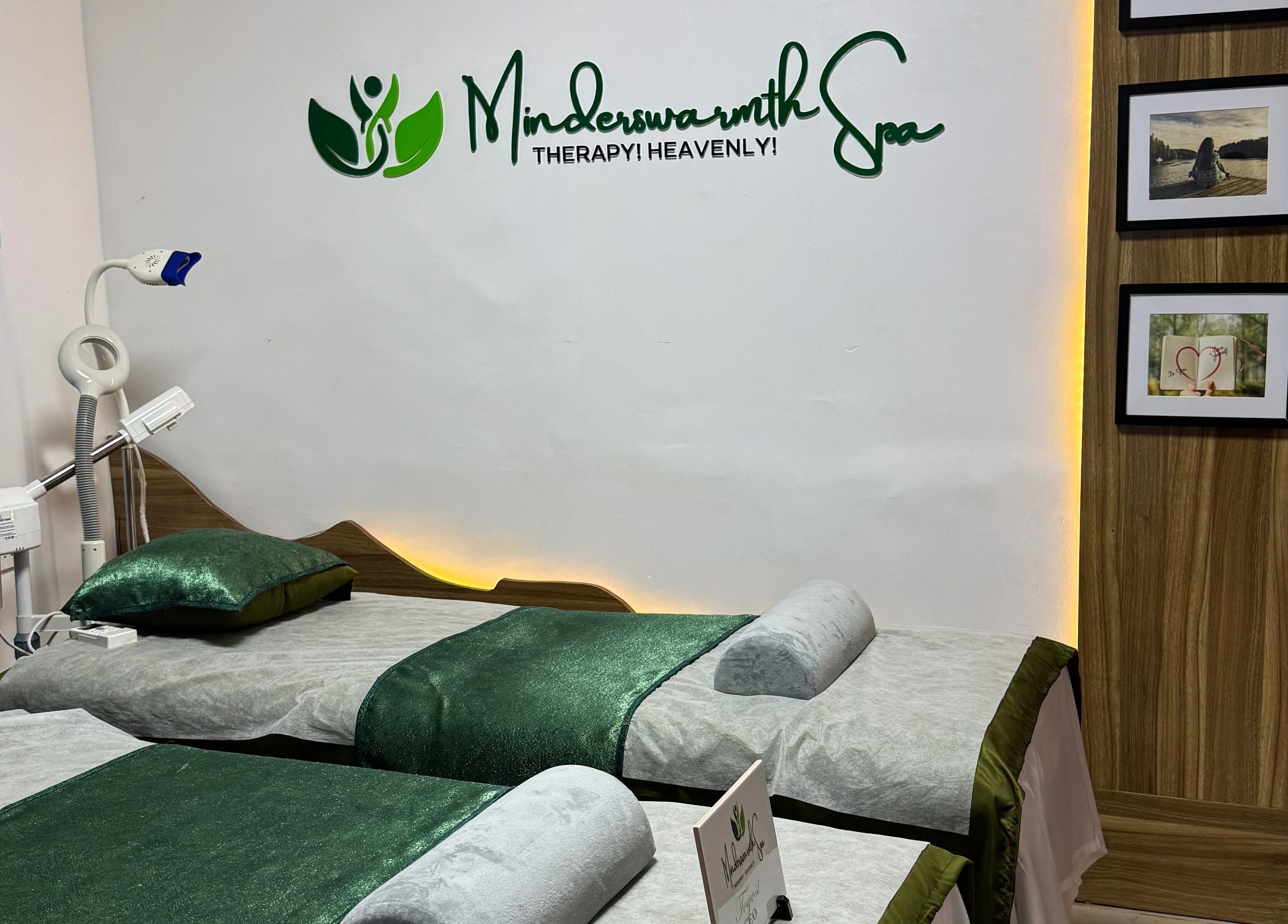 Relaxing therapy beds at Minderswarmth Spa in Lekki, Lagos, NG with elegant decor inviting peaceful rejuvenation.