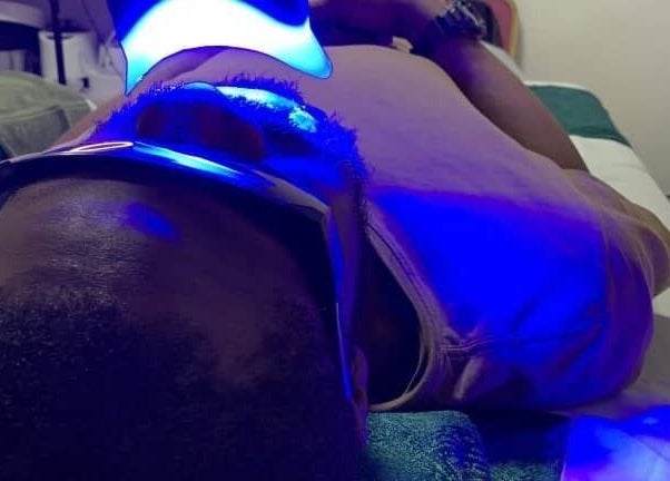 Person receiving LED therapy at Minderswarm Spa, Lekki, Lagos, NG, enjoying a rejuvenating wellness experience.