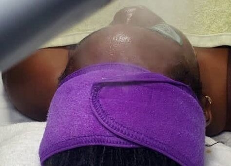 Facial treatment at Minderswarmth Spa, Lekki, Lagos, NG with lavender headband and soothing steam.