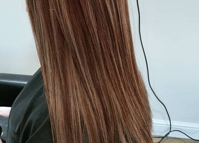 Smooth, straight brown hair at Bare Hair and MoonFlower Holistics in Oughterby, England, GB.