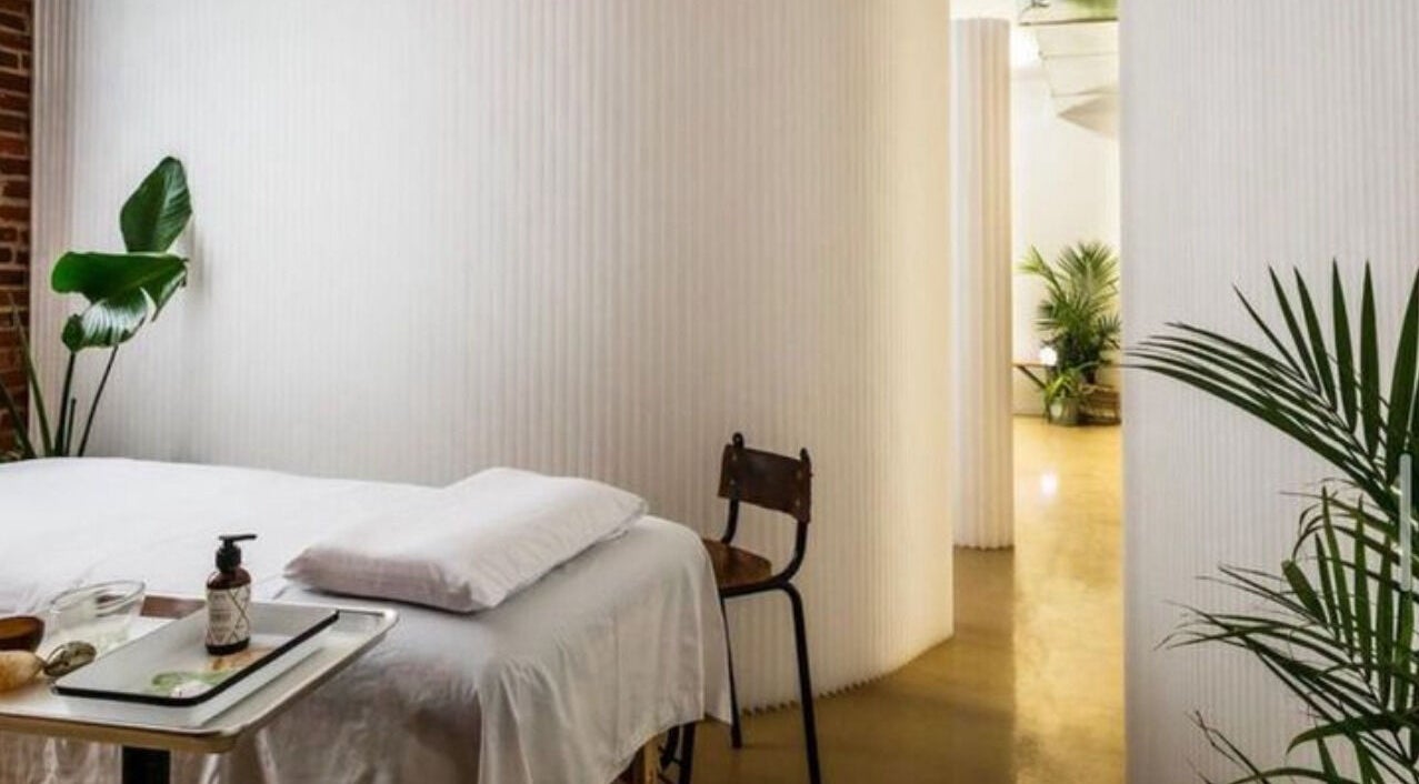 Massage room at Note To Self Wellness, Philadelphia, Pennsylvania, US, with a serene, minimalist design.
