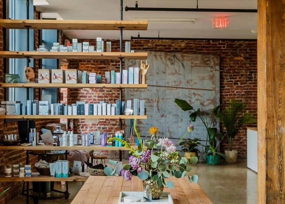 Shelves with wellness products at Note To Self Wellness, Philadelphia, Pennsylvania, US, in a rustic setting.