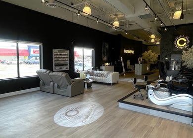 Interior of ChaimsPro Medical Aesthetics in Pickering, Ontario featuring elegant seating and modern decor.