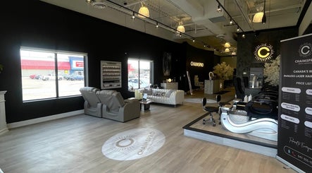Interior of ChaimsPro Medical Aesthetics in Pickering, Ontario featuring elegant seating and modern decor.