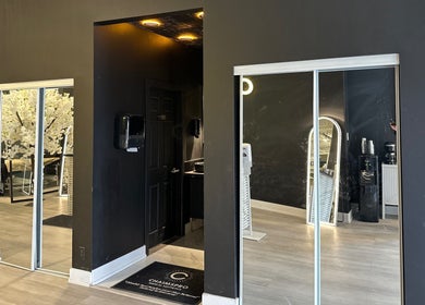 Modern entrance of ChaimsPro Medical Aesthetics in Pickering, Ontario, CA, featuring sleek decor and lighting.