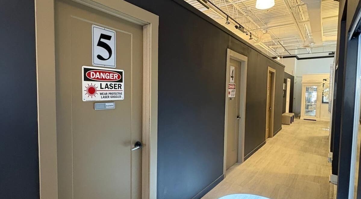 Corridor with laser room doors at ChaimsPro Medical Aesthetics - Pickering in Pickering, Ontario, CA.