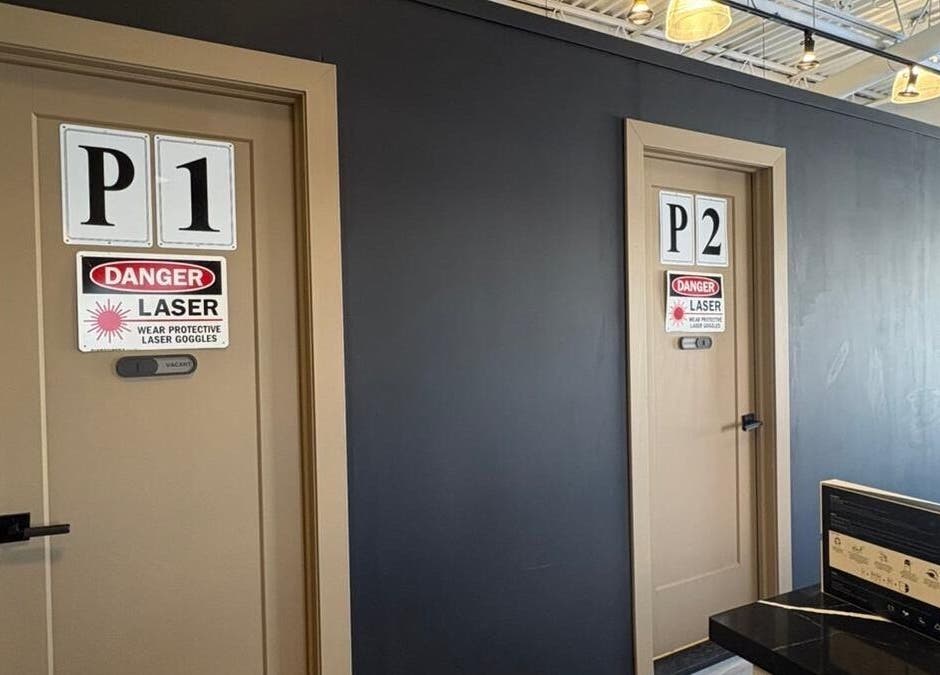 ChaimsPro Medical Aesthetics - Pickering laser treatment rooms with safety signs in Pickering, Ontario, CA.