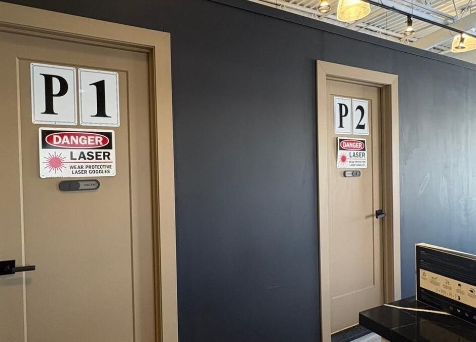 ChaimsPro Medical Aesthetics - Pickering laser treatment rooms with safety signs in Pickering, Ontario, CA.