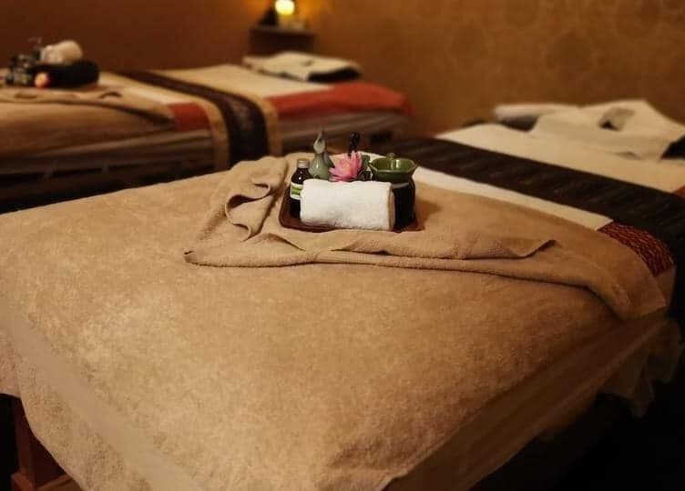 Serene massage room at Suwanwara Massage & Healing Centre, Crows Nest, New South Wales, AU, featuring plush beds.