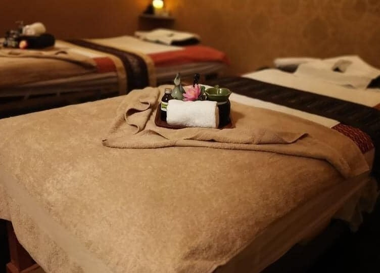 Serene massage room at Suwanwara Massage & Healing Centre, Crows Nest, New South Wales, AU, featuring plush beds.