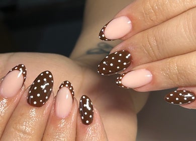 Stylish polka dot nail art at Shanice Marie Beauty in Taunton, England, GB.