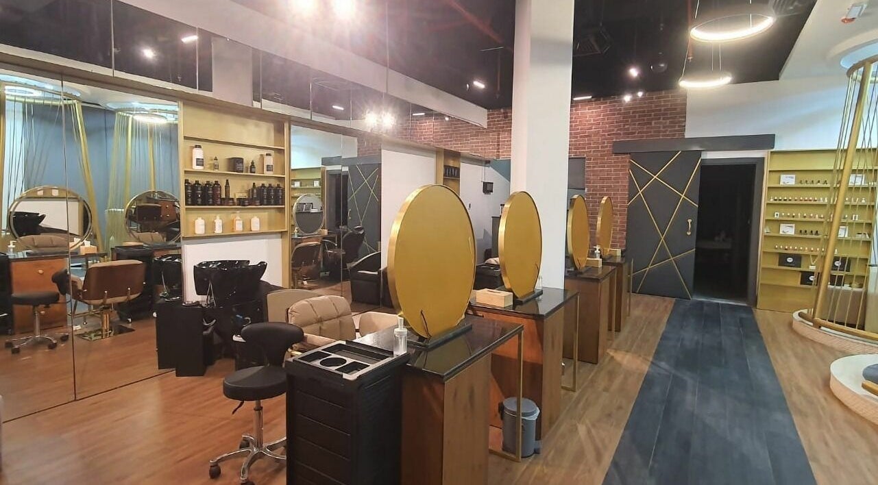 Stylish interior of Ella Vera Lounge Spa in Al Ain, AE with modern decor and beauty stations.