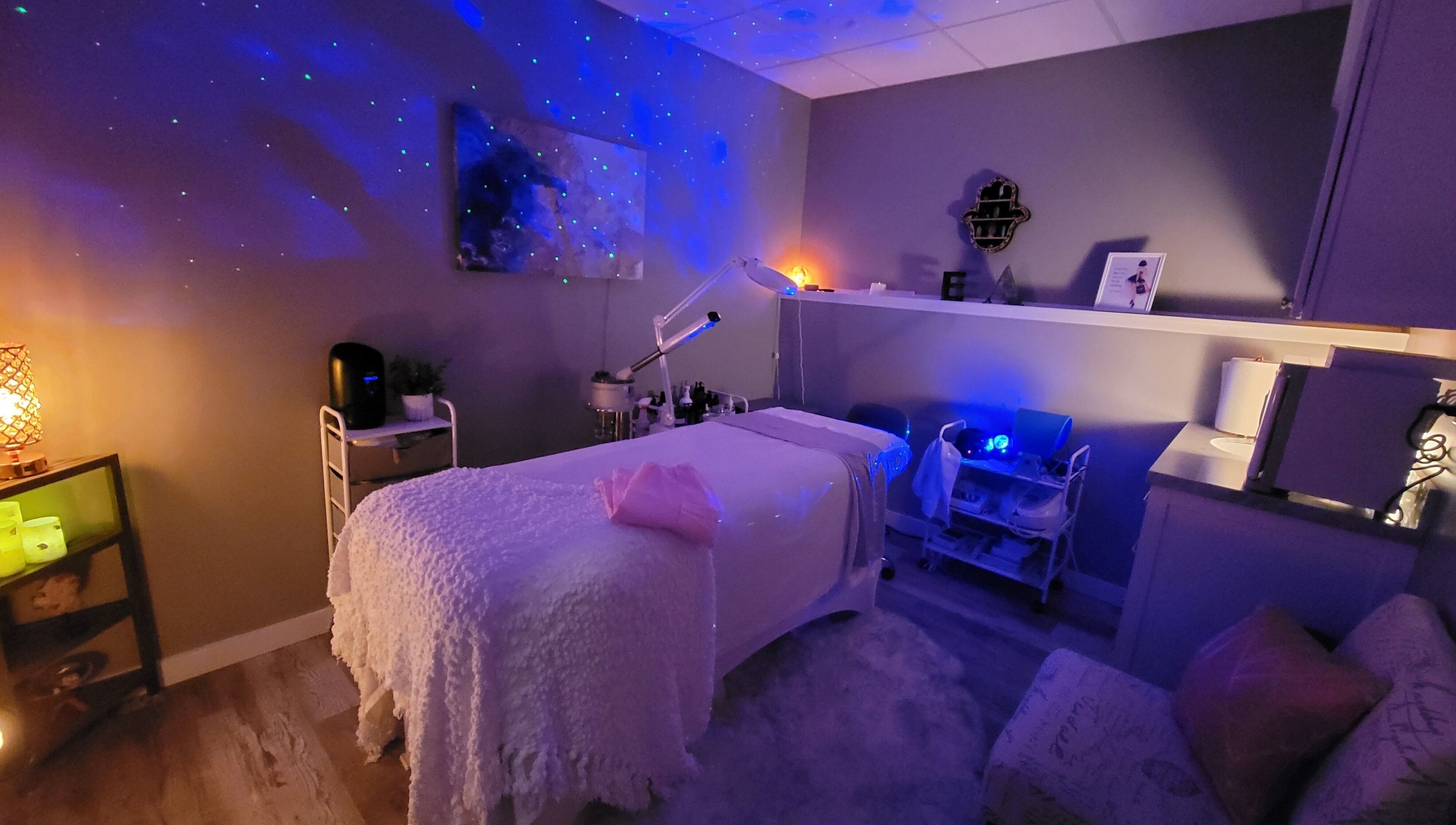 Relaxing spa room at Elemental Aesthetics in Mahopac, New York, US, with calming lighting and cozy decor.