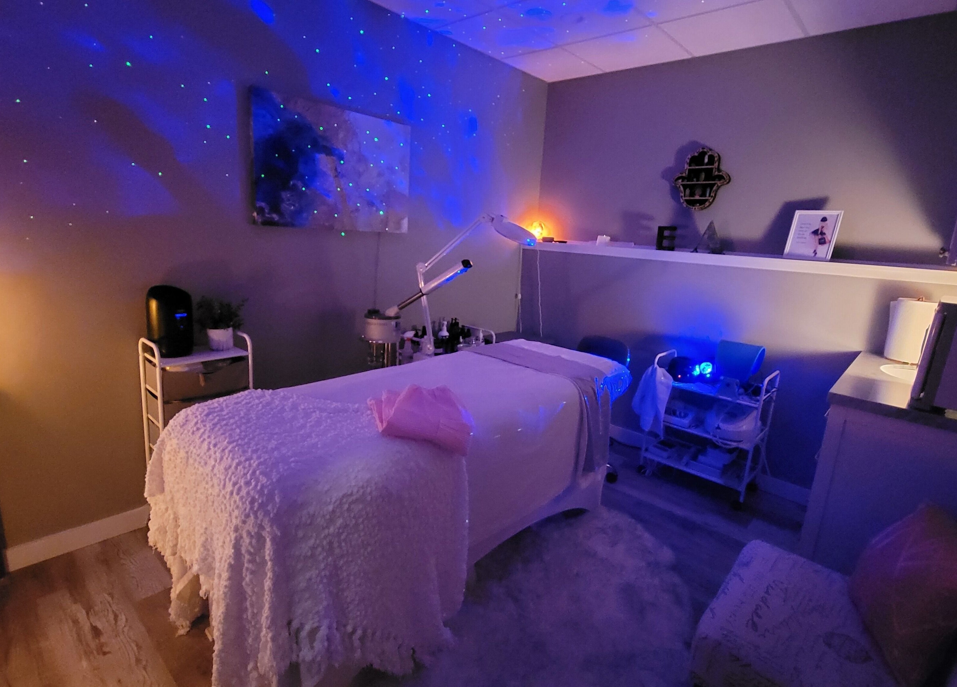 Relaxing spa room at Elemental Aesthetics in Mahopac, New York, US, with calming lighting and cozy decor.