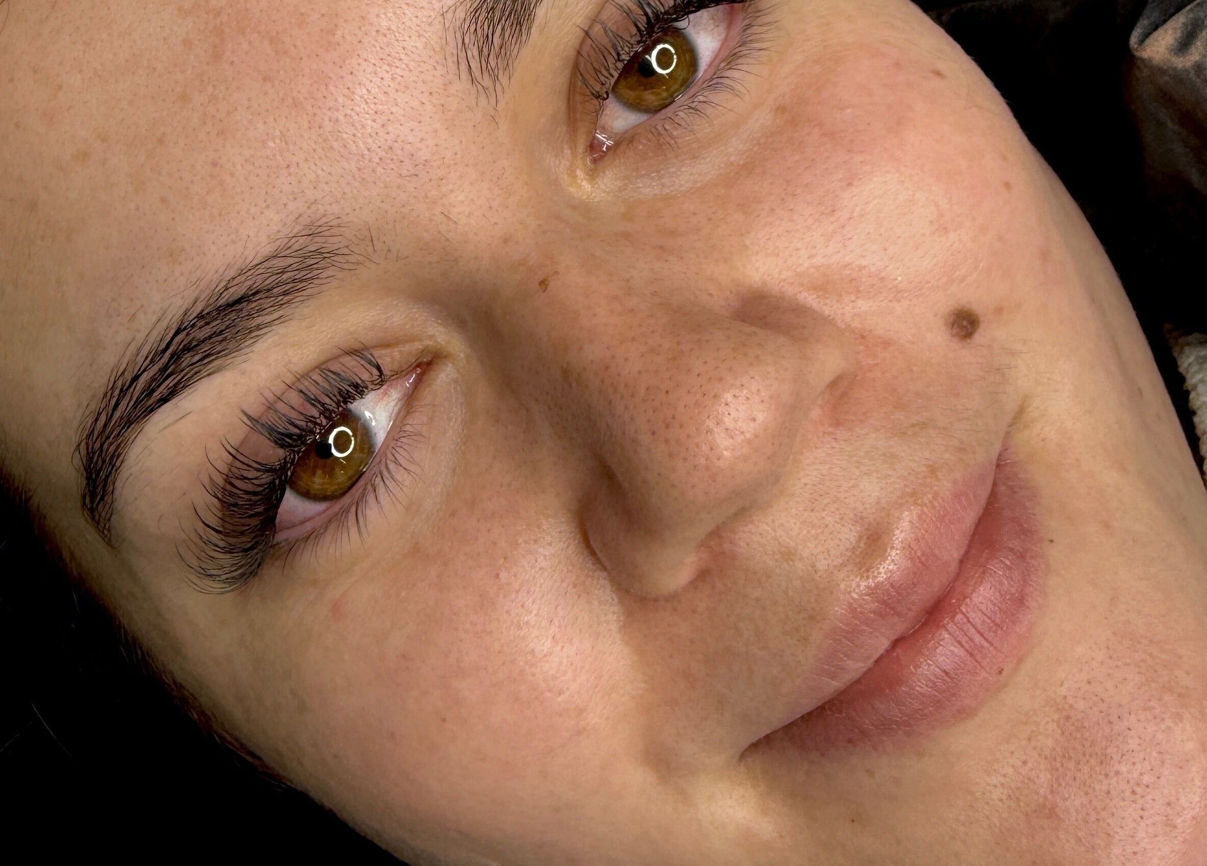 Close-up of a client's glowing skin at Willow and Sage Beauty, Moss Vale, New South Wales, AU.