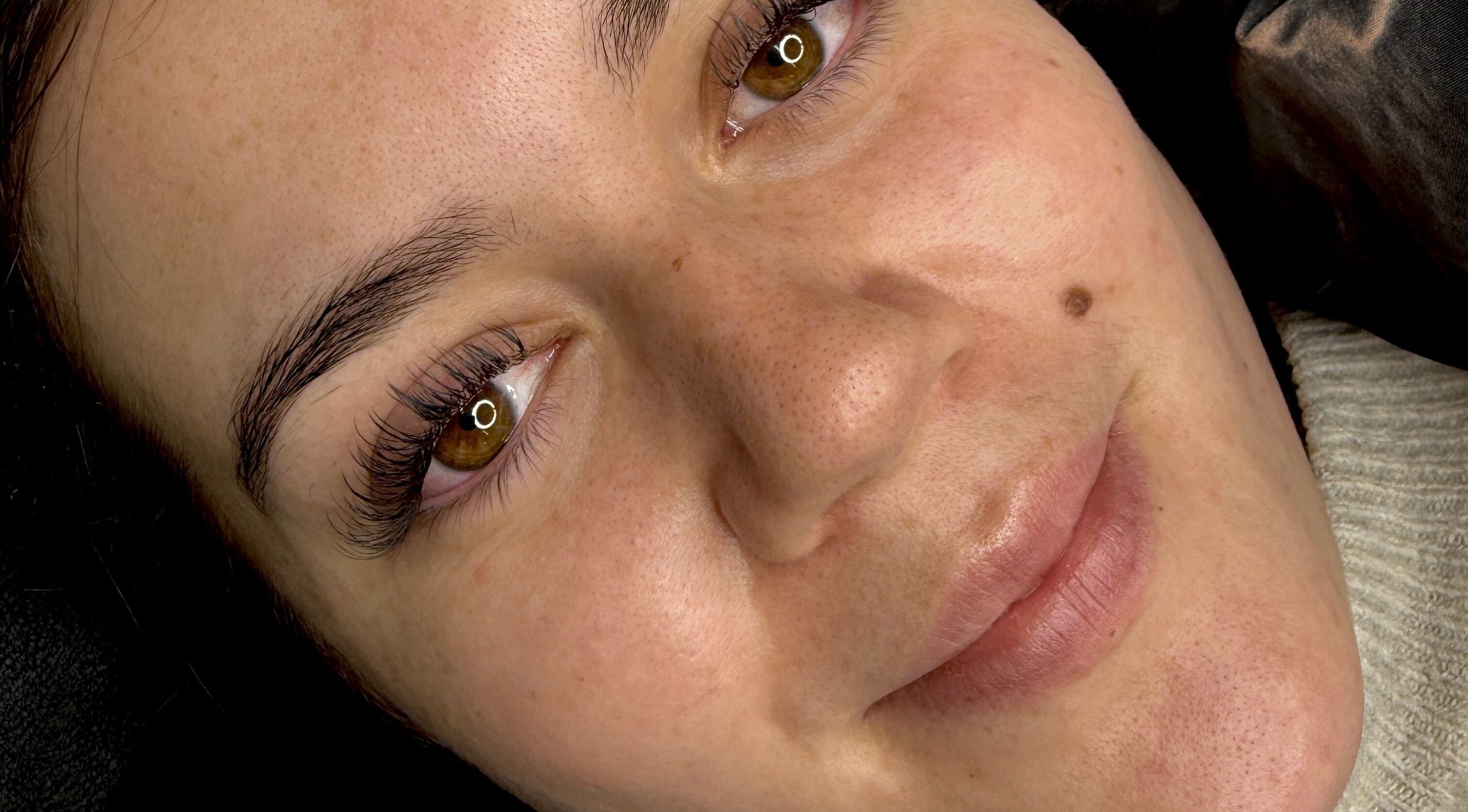 Close-up of a client's glowing skin at Willow and Sage Beauty, Moss Vale, New South Wales, AU.