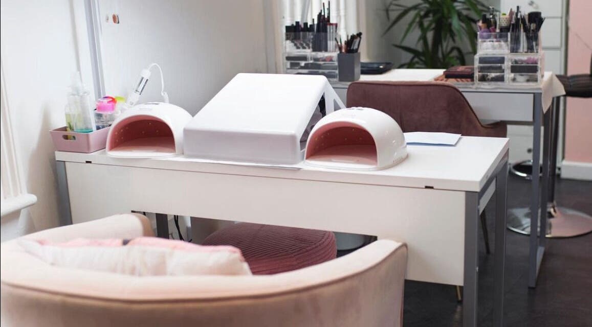 Chic manicure station at Rita&Phil’s Salon in Saint Peter Port, Guernsey, GG featuring modern nail equipment.