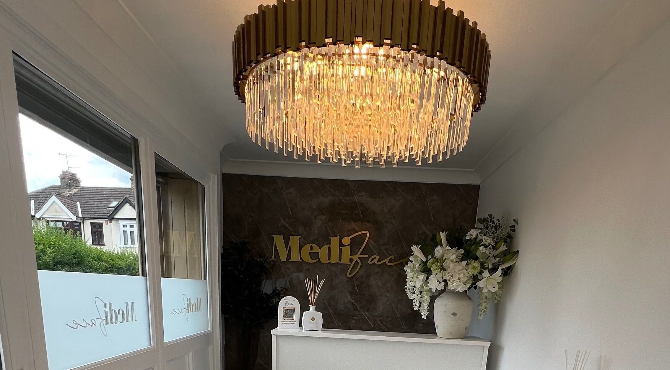 Luxurious reception at MediFace - Emerson Park, Hornchurch with chandelier and floral decor, Hornchurch, England, GB.