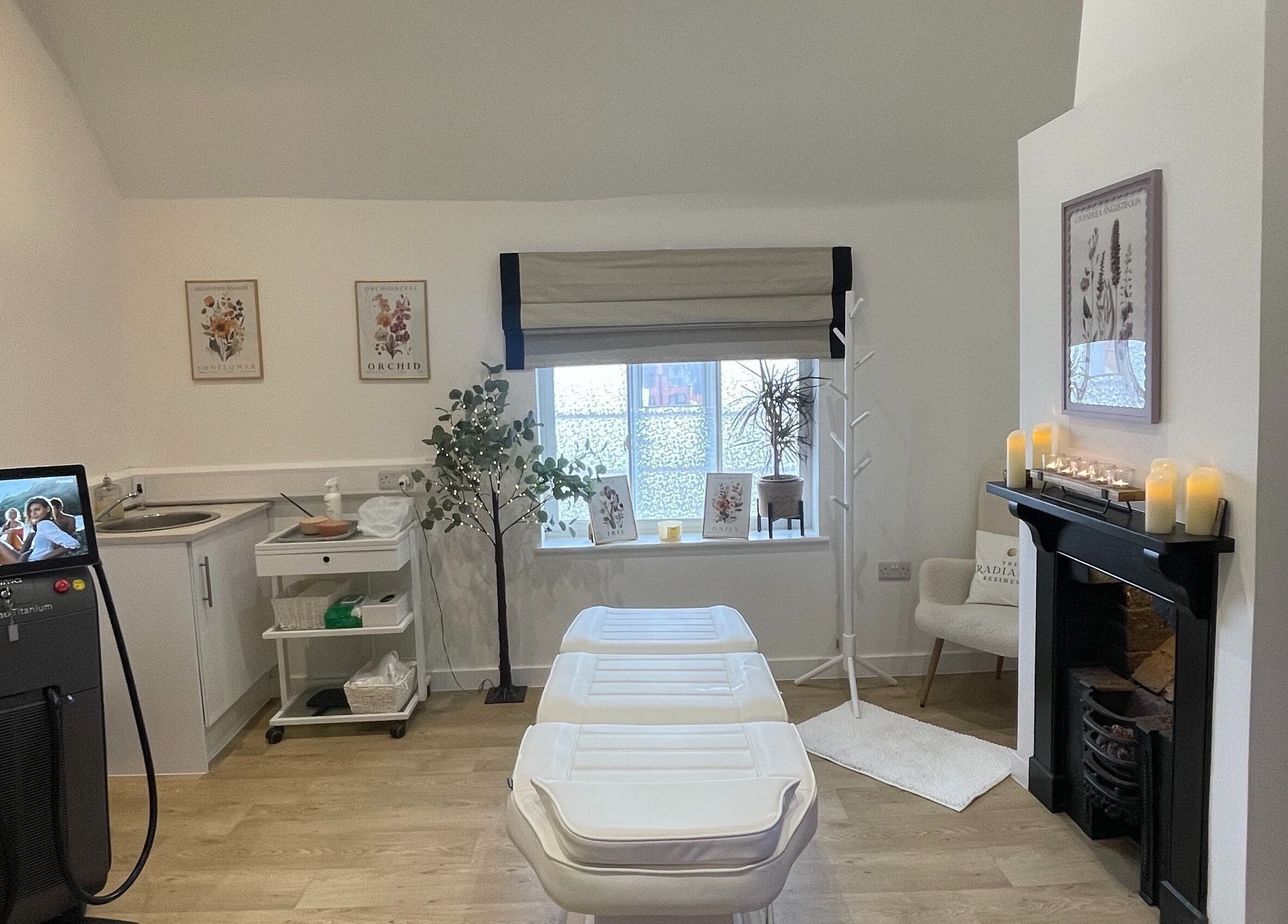 Elegant treatment room at Bare & Brilliant, Lichfield, England, GB, featuring comfortable beds and serene decor.