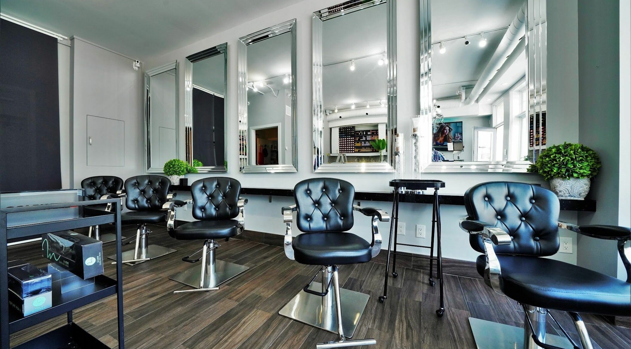 Chic salon interior with stylish chairs at Salon 77 Hair Design Markham, Markham, Ontario, CA.