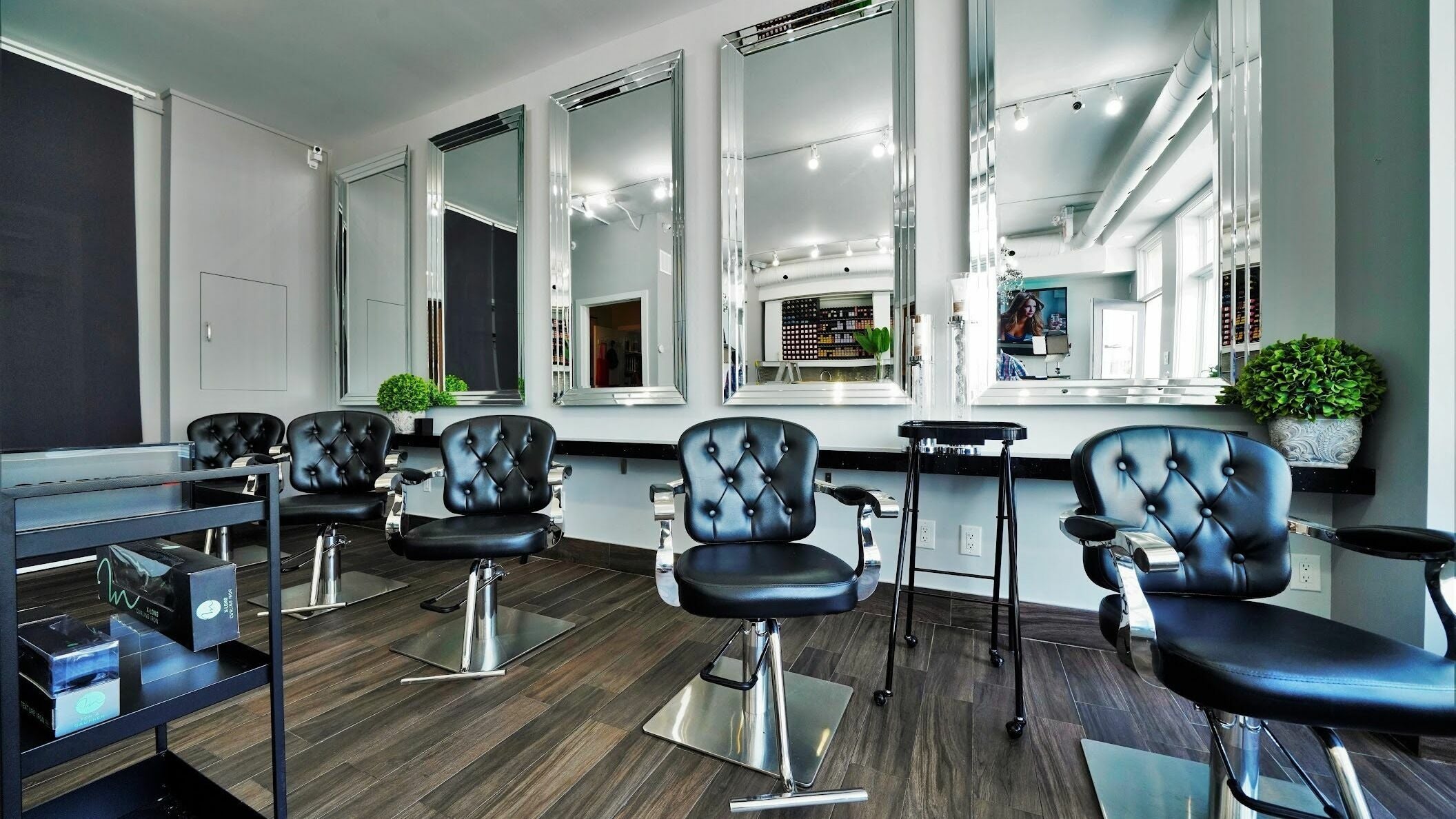 Chic salon interior with stylish chairs at Salon 77 Hair Design Markham, Markham, Ontario, CA.