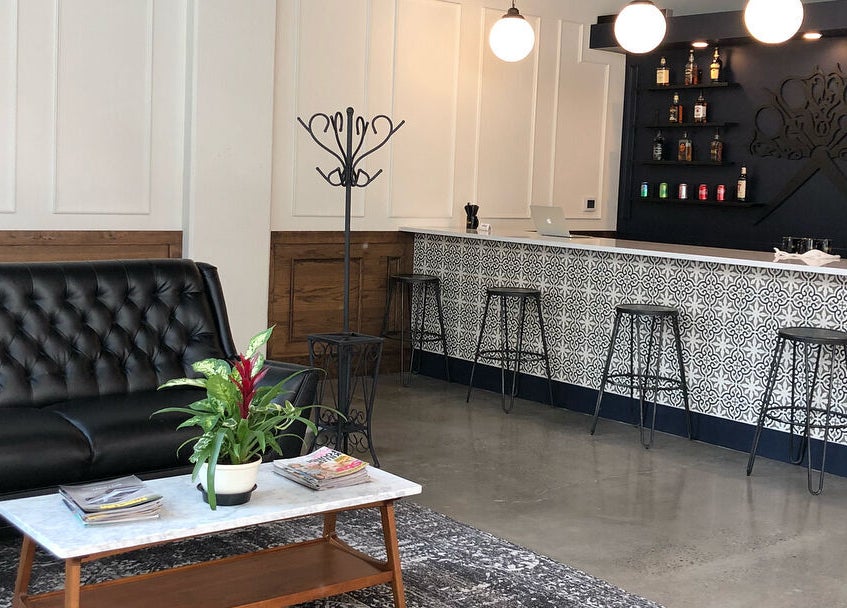 Modern interior of Throne Traditional Barbershop on Williams in Portland, Oregon, US with stylish decor.