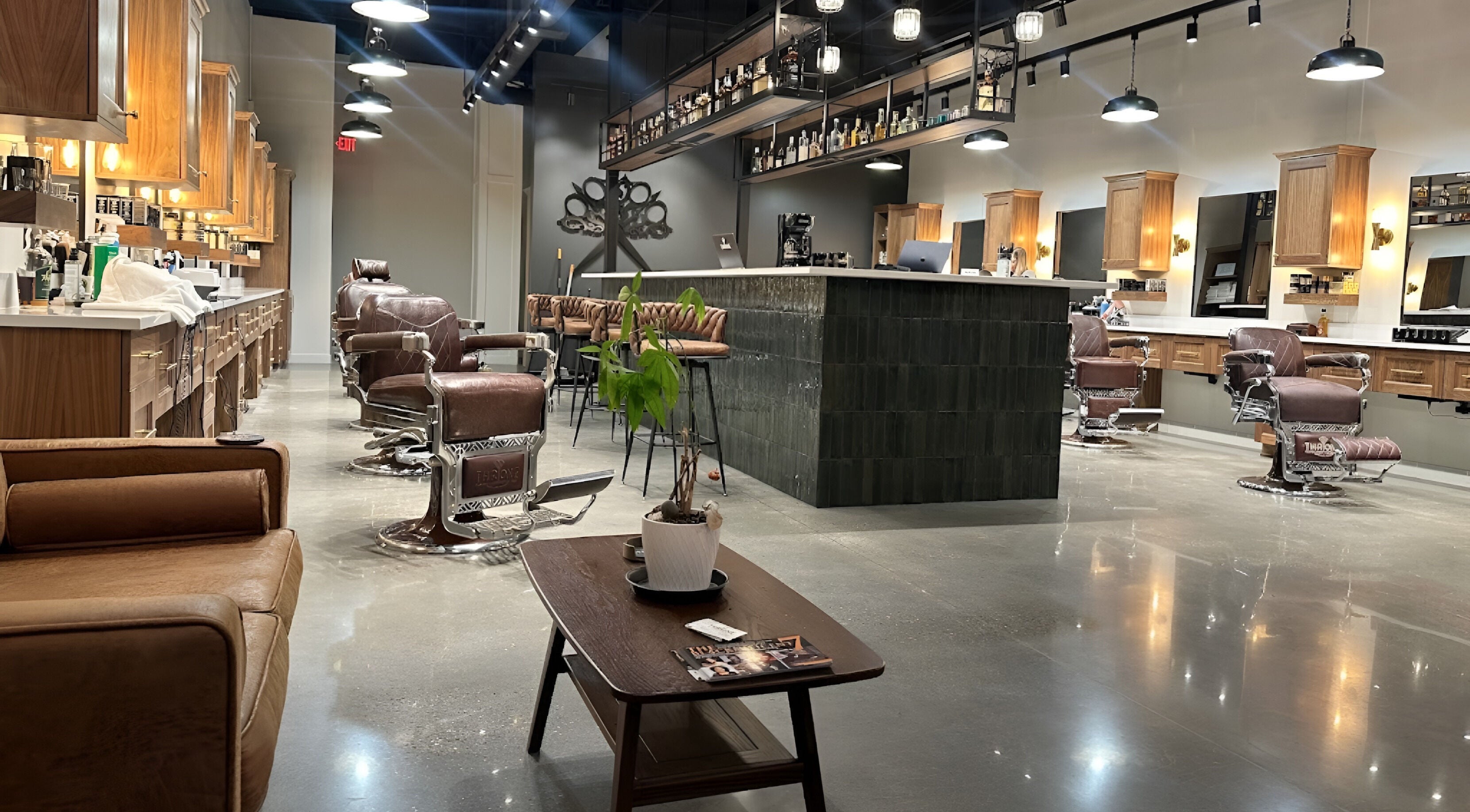 Interior of Throne Traditional Barbershop on Division, Portland, Oregon, US, featuring leather chairs and modern decor.