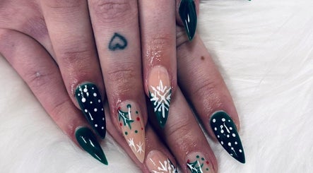 Festive green and white snowflake nails by Bloodstone Nail Designs, La Valle, Wisconsin, US.