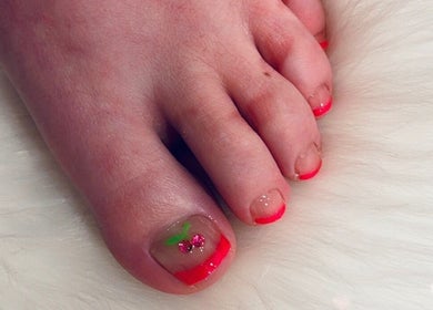 Vibrant cherry nail art on toes at Bloodstone Nail Designs in La Valle, Wisconsin, US.