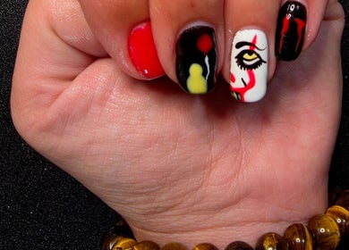 Artistic nail art at Bloodstone Nail Designs in La Valle, Wisconsin, US, featuring vibrant, unique designs.