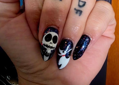 Gothic-inspired nail art at Bloodstone Nail Designs in La Valle, Wisconsin, US featuring unique skull and ghost motifs.