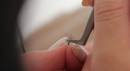 Detail of precision eyelash application at SLIQ studio, Pretoria, Gauteng, ZA.