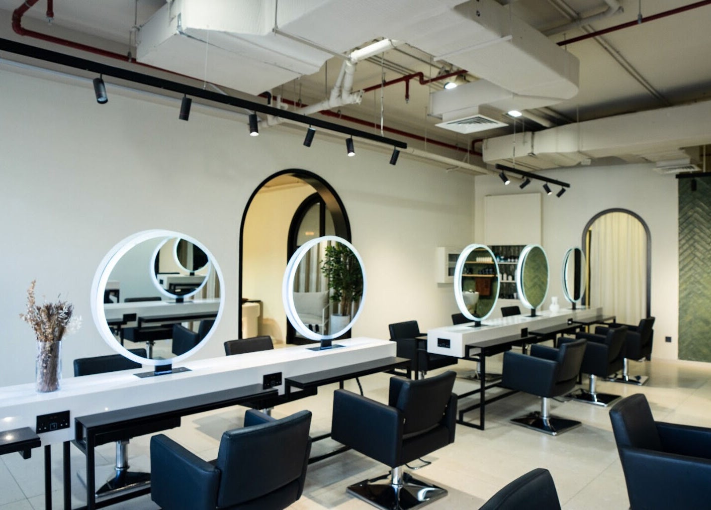 Stylish beauty salon at The Green House, Dubai, Dubai, AE with chic decor and modern lighting.