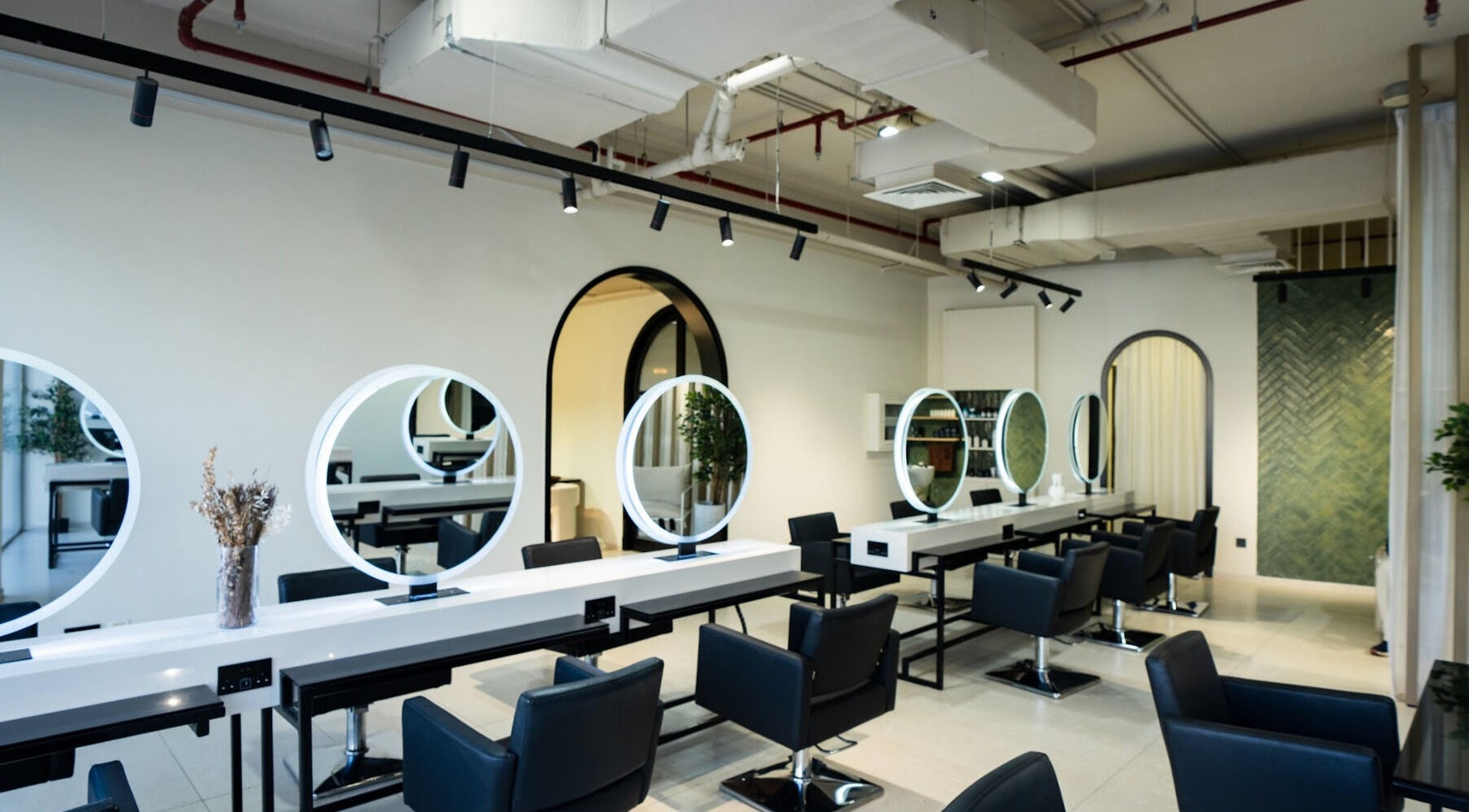 Stylish beauty salon at The Green House, Dubai, Dubai, AE with chic decor and modern lighting.