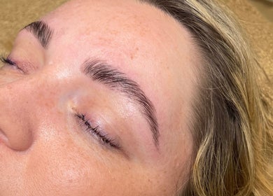 Close-up of perfectly styled eyebrows at Lara Kingshott Beauty in Bedford, England, GB.