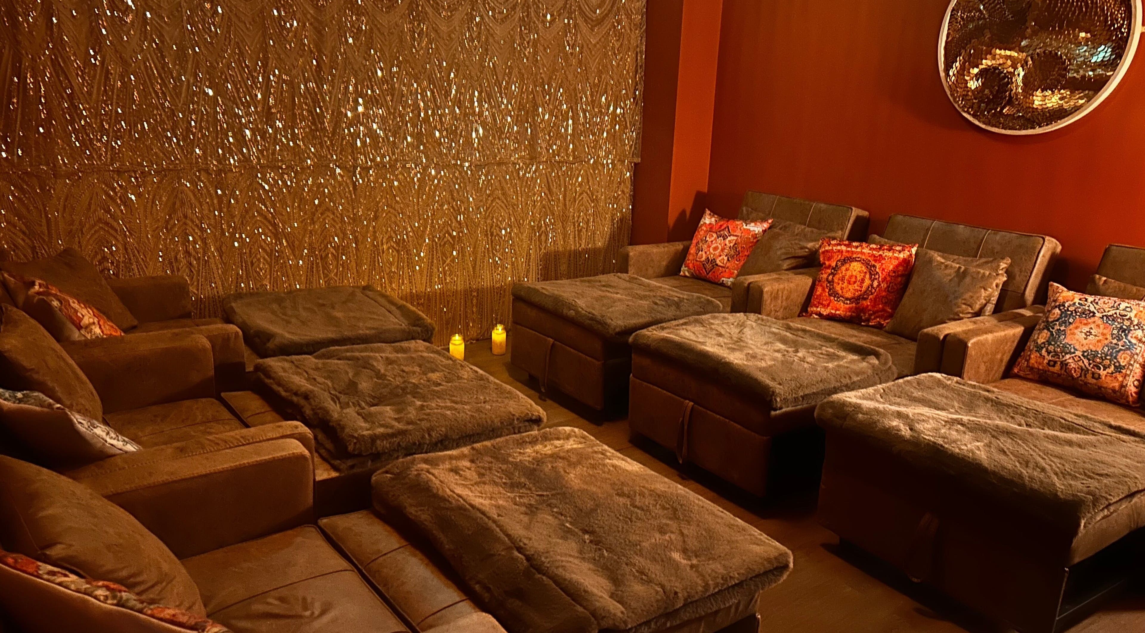 Cozy lounge area with plush seating at Urban Spa, Swansea, Wales, GB for ultimate relaxation.