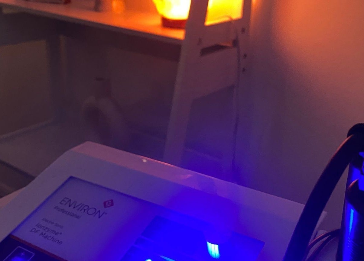 Modern beauty equipment glows softly at Eloquin, Basingstoke, England, GB for advanced skincare treatments.