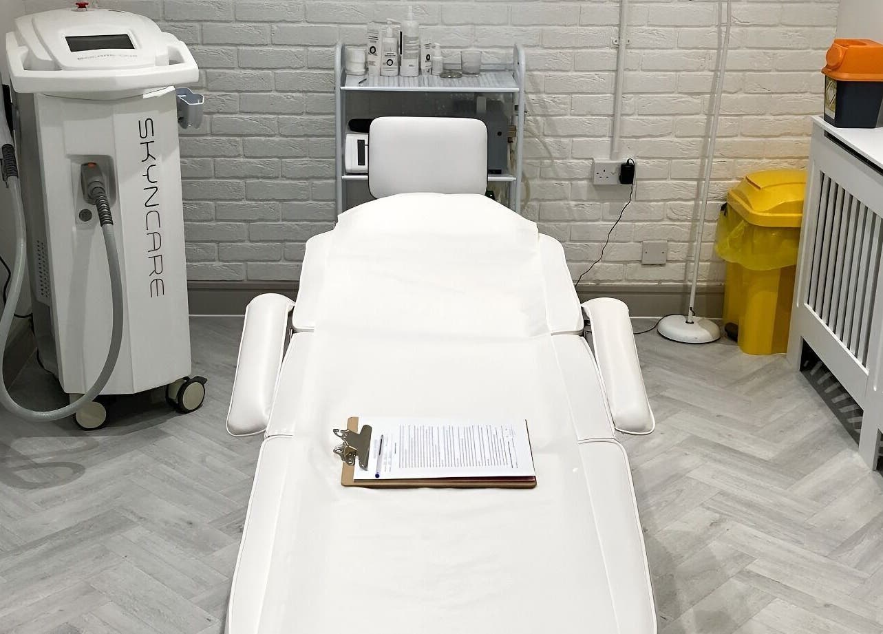 Treatment room at Samantha Maunder Skin & Laser, Penarth, Wales, GB, featuring Skincare machine and relaxing setup.