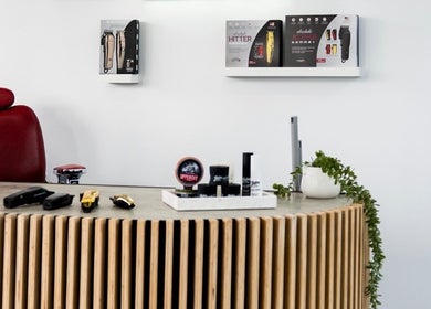 Sophisticated barber station at Aidans Cuts Barbershop, Melbourne, Victoria, AU featuring clippers and grooming products.