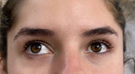 Close-up of perfectly groomed brows at Gazal Beauty in Hillcrest, San Diego, California, US.
