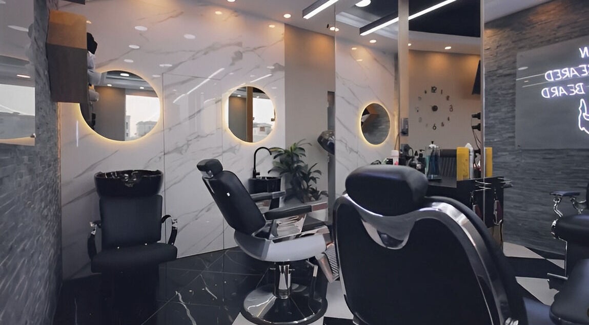 Chic salon chairs and decor at Style House Gents Salon, Abu Dhabi, Abu Dhabi, AE, showcasing luxury grooming.