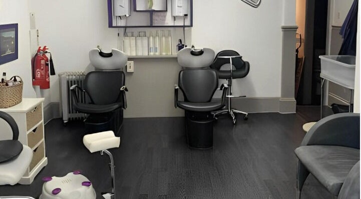 Modern salon chairs at Vanessa's 4 Hair & Beauty in Worthing, England, GB offer a stylish and comfortable experience.