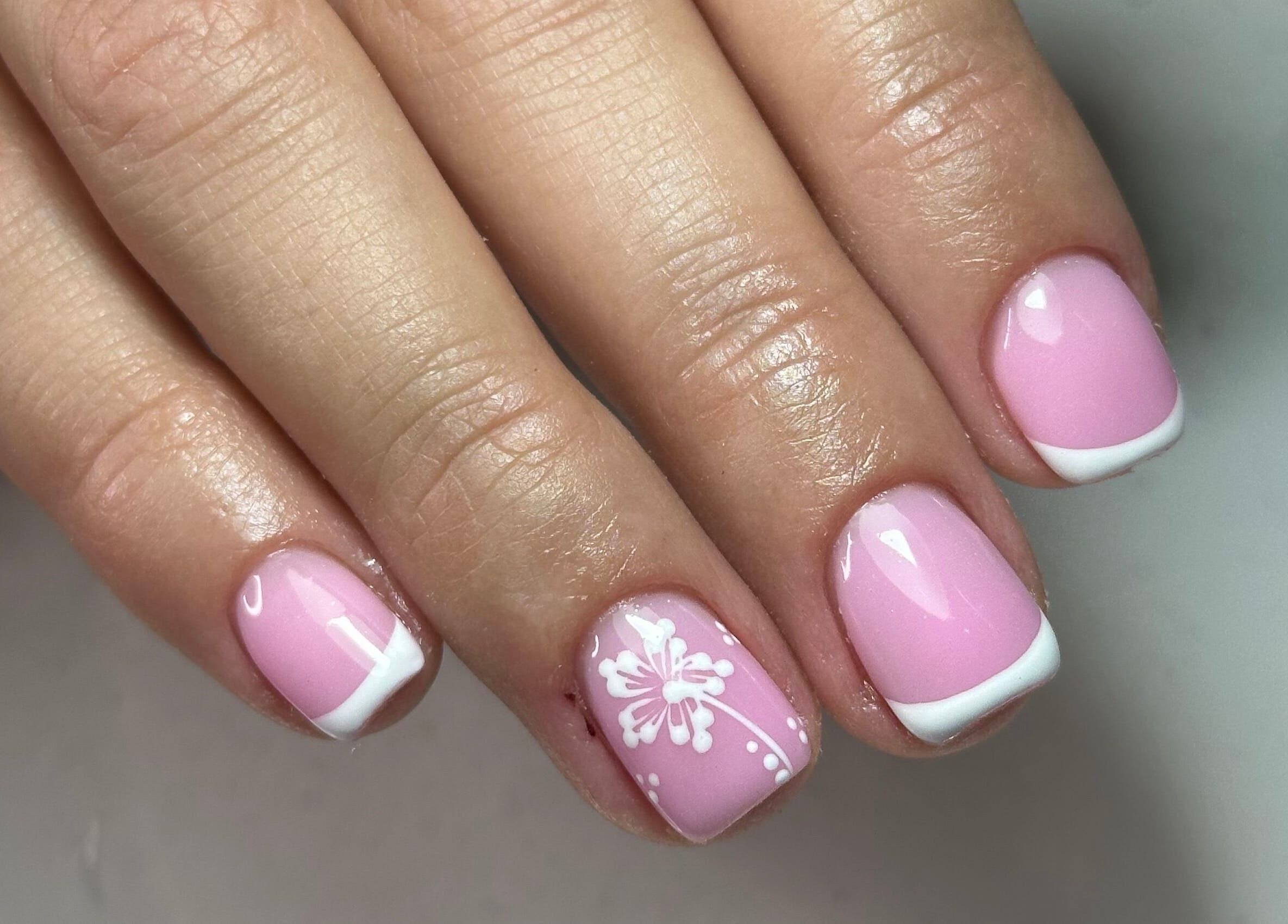 Elegant pink nails with floral design at LKR Beauty, Wigan, England, GB.